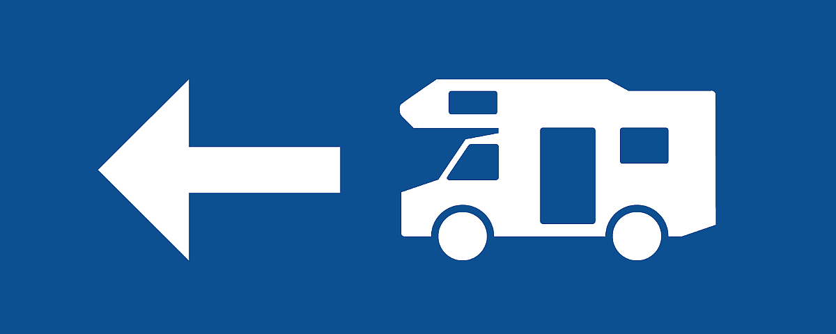 Pictogram of a motorhome with a white arrow pointing left on a blue background.